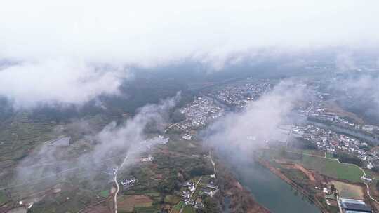 高空云层下的安徽皖南乡村景色