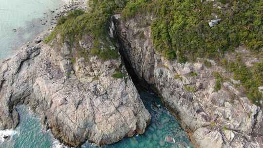 无人机航拍大鹏东西涌海岸线礁石海边山洞穴