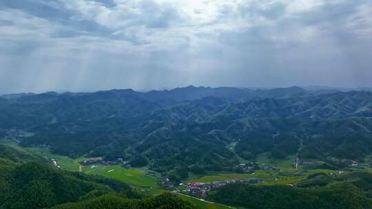 蓝天白云航拍延时丘陵地带美丽乡村竹海水稻