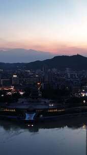 竖屏航拍四川宜宾三江交汇处合江楼晚霞夜景