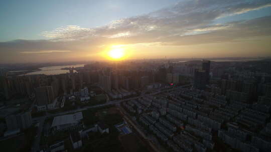 武汉光谷企业天地航拍城市建筑落日地平线视频素材模板下载