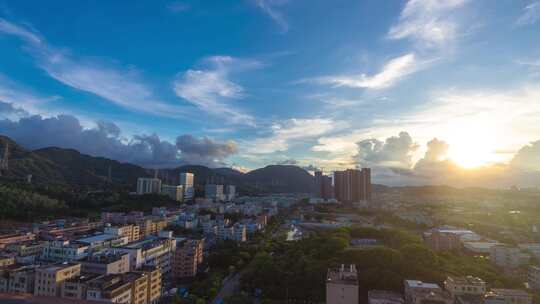 云层翻滚城市夕阳天空全景