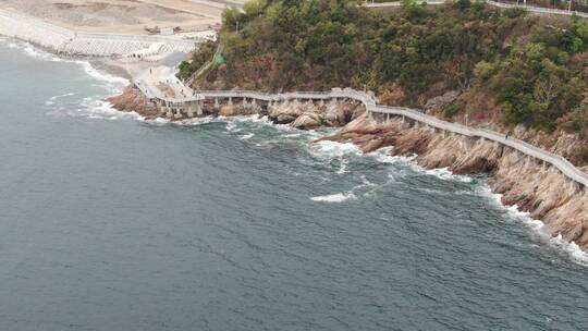 4K航拍深圳大梅沙海滨步道大海礁石