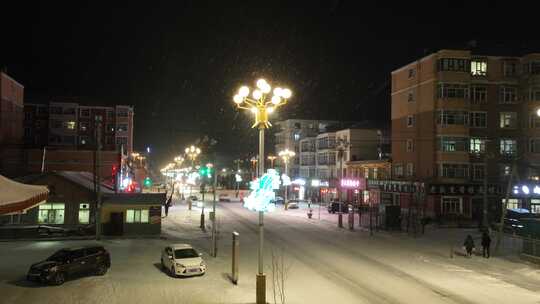 航拍东北城市雪夜灯光夜景视频素材模板下载