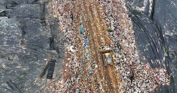 航拍推土机在大型城市垃圾场作业环境保护