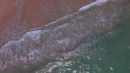 西冲沙滩航拍顶视图旋转镜头视频素材模板下载