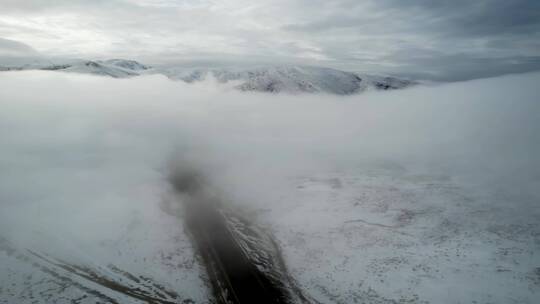 青海青藏高原橡皮山雪山云海航拍盛景