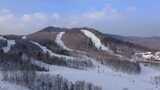 【4K】长白山万达滑雪场4K航拍/户外雪场高清在线视频素材下载