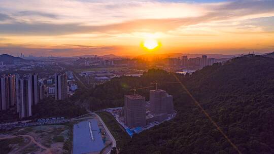 城市上空在建楼房日落航拍延时