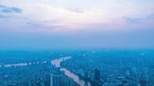 广州珠江岸城市建筑群与夕阳晚霞航拍延时