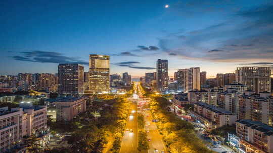 海南三亚中央商务区城市夜景车流延时航拍视频素材模板下载