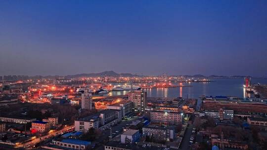 山东烟台港口海滨城市夜景航拍城市风光