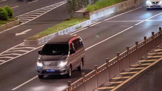 夜晚快速路隧道口车流马路行车亮化