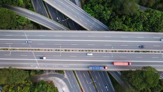 航拍山丘之间乡间高速公路道路交通枢纽视频素材模板下载