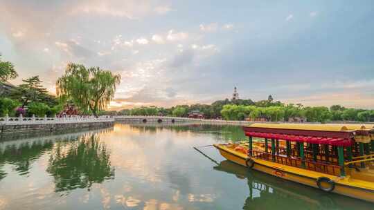 北京北海公园白塔亮灯落日晚霞日转夜延时视频素材模板下载