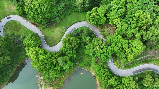 航拍汽车行驶在盘山公路