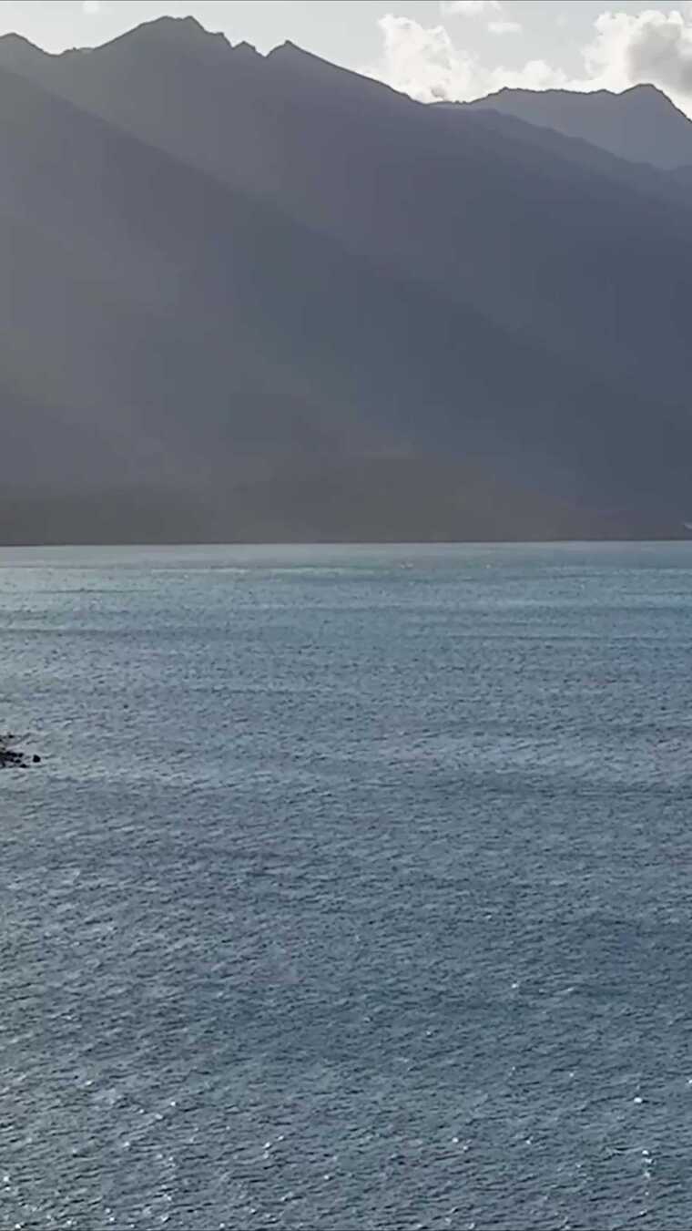 新西兰皇后镇海边早晨耶稣光