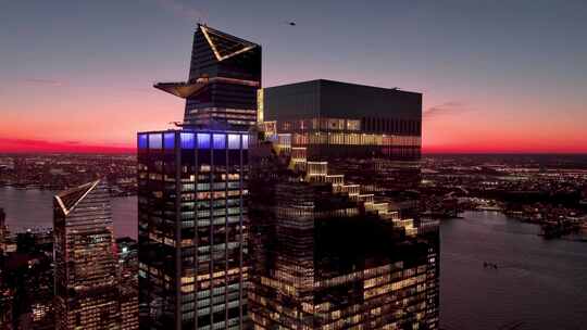 航拍曼哈顿哈德逊广场摩天大楼夜景灯光日落视频素材模板下载