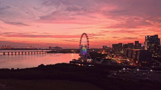 深圳宝安欢乐港湾摩天轮晚霞远景前进