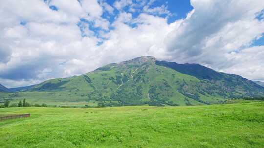 新疆北疆阿勒泰禾木村夏天高山草原风景航拍