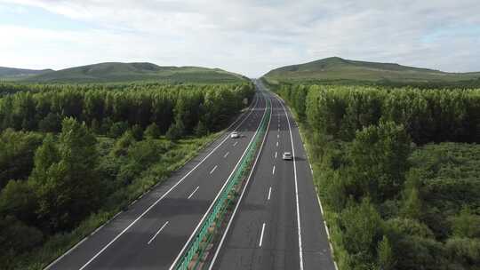 航拍内蒙草原公路风车