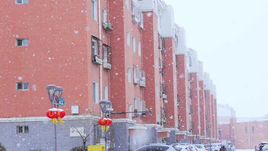 城市居民小区下雪雪景