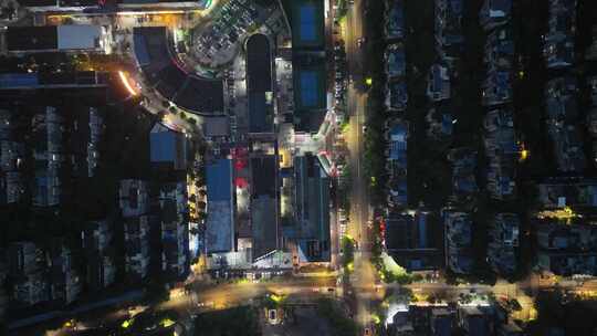 鸟瞰城市小区夜景道路网航拍