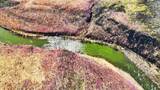 航拍内蒙古毕拉河峡谷火山地貌高清在线视频素材下载