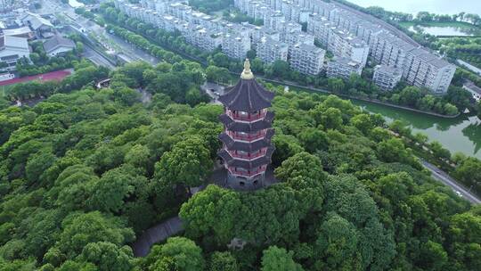 绍兴蕺山公园文笔塔与世茂天际中心建筑风光
