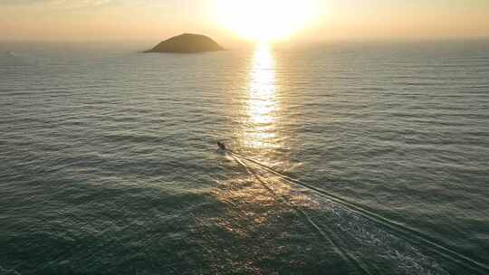 4k海南万宁乌场渔港灯塔渔船海上日出航拍