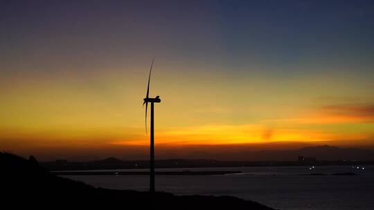 唯美风车海边傍晚夕阳晚霞泉州风车岛风车视频素材模板下载