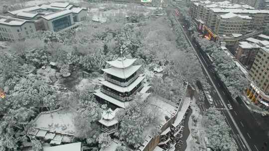 4k航拍衡阳市雁峰区回雁峰雪景