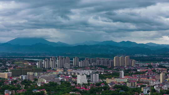 乌云压境暴风雨台风雷雨天气城市上空