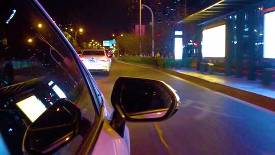 城市夜晚汽车窗外的风景夜景视频素材