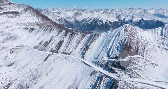 航拍川西美丽雪山风景夹金山下山路盘旋