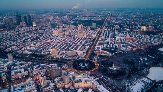 吉林长春冬季雪景航拍城市新民广场夜景