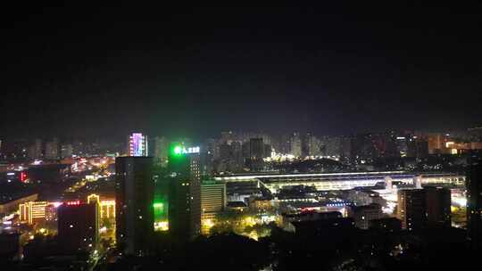 俯瞰视角下灯火通明的火车站夜景九江站夜景