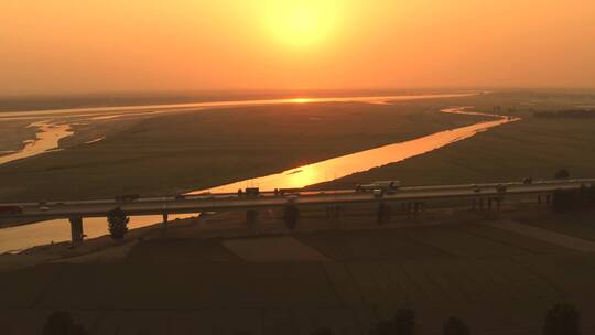 航拍高速公路大桥夕阳视频素材模板下载