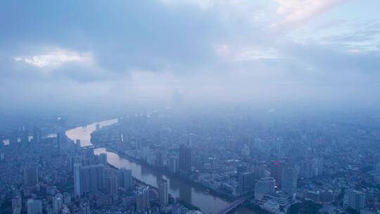 广州珠江岸城市高楼建筑与天空云雾航拍
