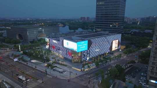 上海嘉定新城TSF购物中心夜晚航拍视频素材模板下载