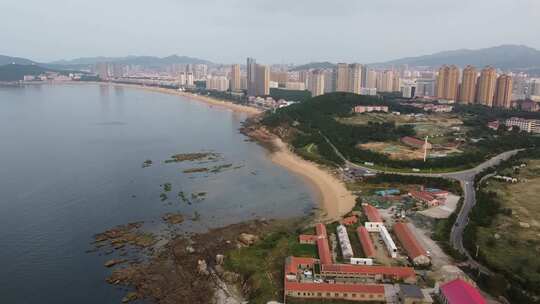 航拍山东威海沿海城市日出日落场景