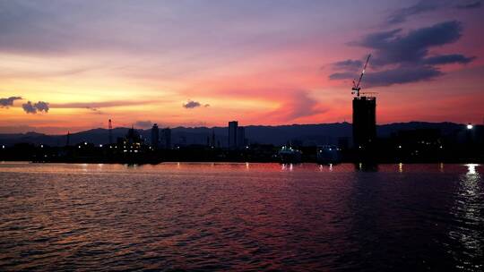 日落时海港的晚霞景色视频素材模板下载