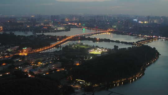 航拍武汉东湖梅园码头傍晚灯光城市桥