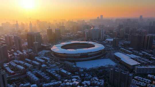 长沙贺龙体育馆日出雪景航拍