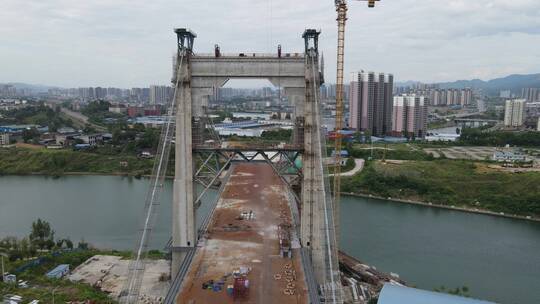 航拍城市在建跨河大桥施工现场