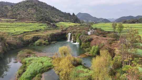 航拍云南瀑布九龙瀑布蓝天白云景点风景旅行