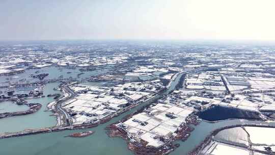 航拍乡镇雪景学校建筑田地大桥别墅河流房屋