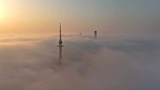 青岛城市建筑电视塔航拍平流雾日出