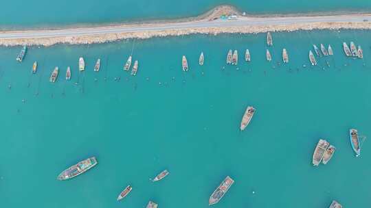 航拍海洋港湾渔船成排城市渔业码头船舶休渔