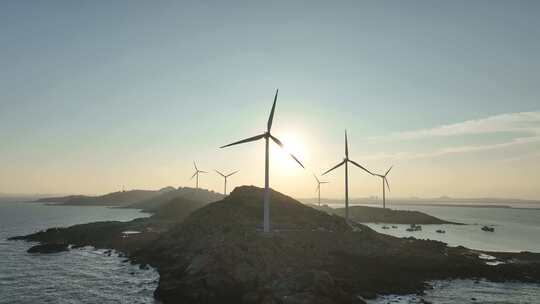 大海日出风车航拍海岛海上发电海洋风力发电